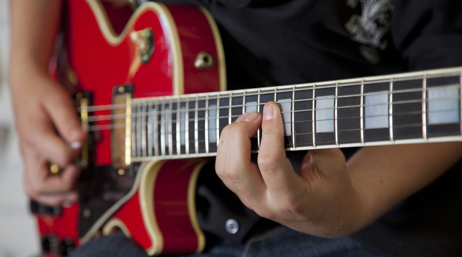 How to Strum Like Your Guitar Heroes